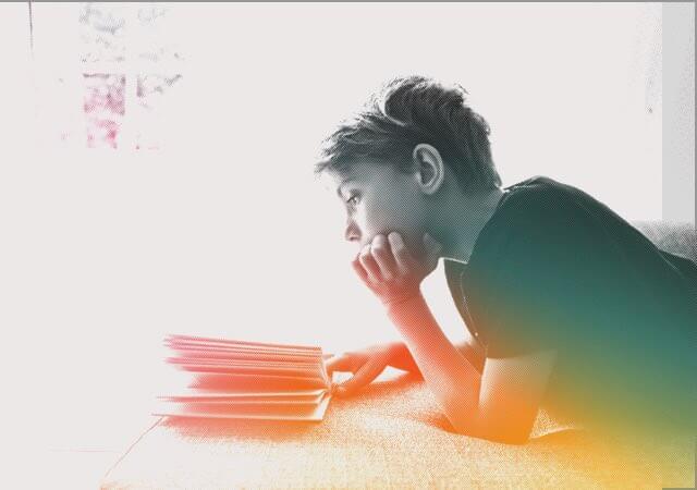 Banner Image: Boy Reading