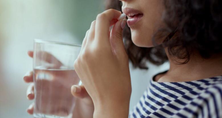 Image: Teen Taking Medication