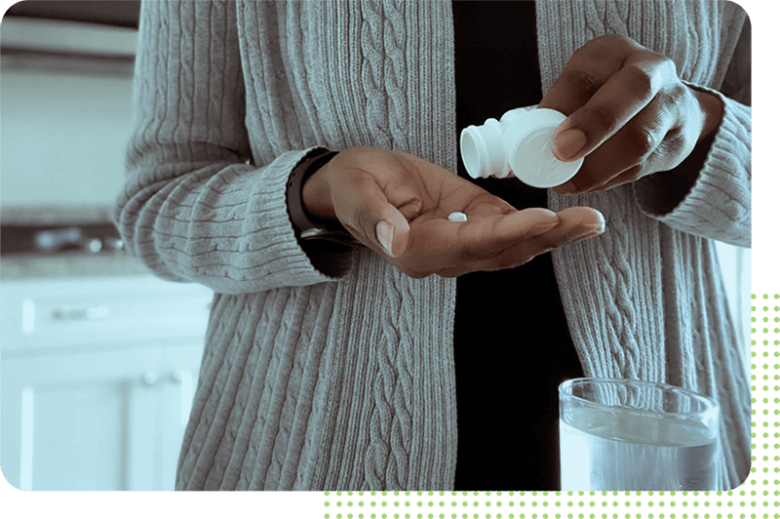 Image: Woman Taking Medication